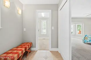 1714 Oakbrook Drive SW, Ocean Isle Beach, NC 28469 – photo 18: dressing area primary bedroom