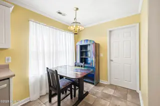 141 Crystal Road, Southport, NC 28461 — 3-bedroom home, Southport, NC, photo 16 of 40: 141 Crystal Rd Breakfast nook