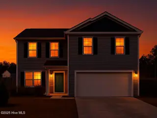 67 Fresh Air Drive, Hampstead, NC 28443 – photo 5: virutally enhanced front dusk