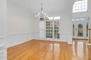 1119 Falling River Walk, Rocky Mount, NC 27804 — 4-bedroom home in River Falls, Rocky Mount, NC, photo 6 of 51: Formal Dining, Trim Galore