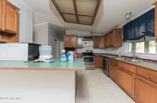 210 Creek Bank Drive, New Bern, NC 28560 — 3-bedroom manufactured home in Creekwater Haven, New Bern, NC, photo 23 of 58: Kitchen