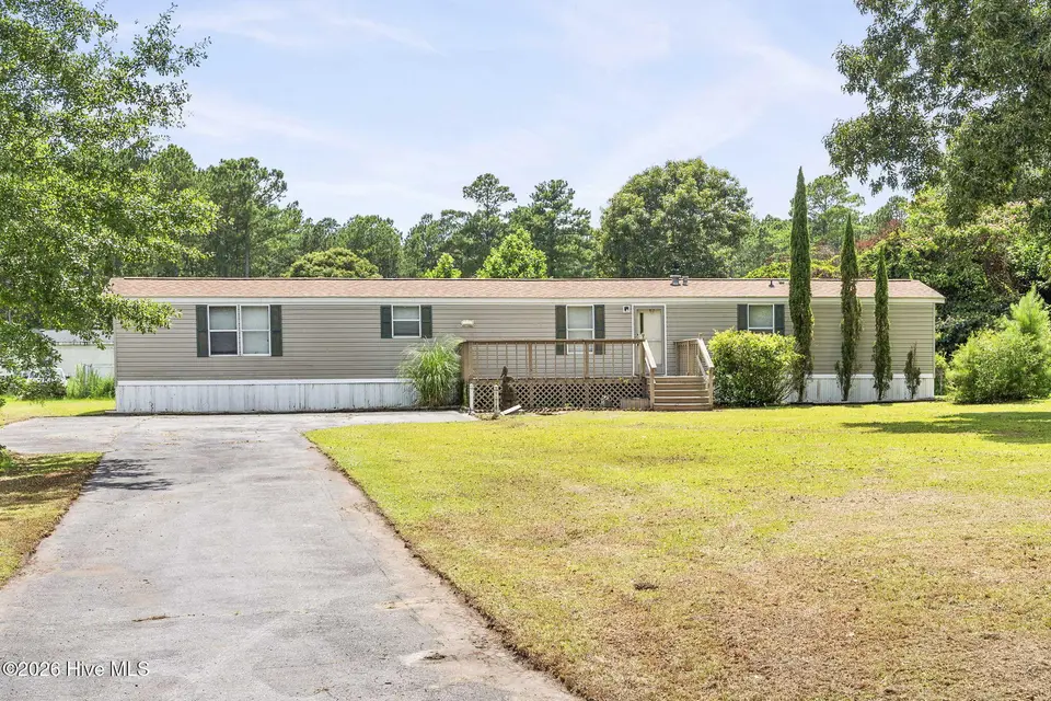 178 Cedarwood Drive, Swansboro, NC 28584 – photo 1 of 26: 1-web-or-mls-174-Cedarwood-6-29-26-001-c