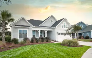 6391 Bryson Drive SW, Ocean Isle Beach, NC 28469 – photo 3: 6391 Bryson Circle Front at twilight