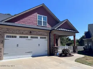412 Taylor Place, Goldsboro, NC 27430 — 2-bedroom townhome in Taylor Commons, Goldsboro, NC, photo 1 of 24: Front