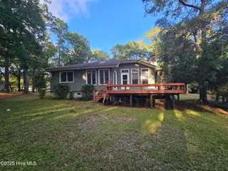 3235 Marsh View Drive SW, Supply, NC 28462 — 3-bedroom home in Lockwood Folly, Supply, NC, photo 22 of 36: Back of House