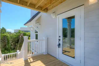 4019 E Pelican Drive, Oak Island, NC 28465 – photo 4: 4019 E Pelican Dr Oak Island-large-004-0