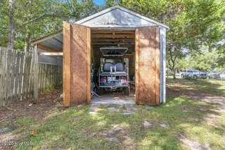 209 NE 56th Street, Oak Island, NC 28465 – photo 19: 16-Final 209 NE 56th St OKI-RJREM-9407