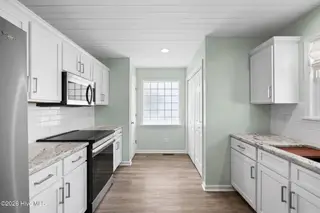 117 NE 52nd Street, Oak Island, NC 28465 – photo 13: 11-web-or-mls-cammediallc.com (31 of 54)