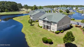 932 Great Egret Circle SW 3, Sunset Beach, NC 28468 – photo 4: mls-DJI_20250416130632_0696_D