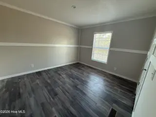 6850 Lewis Drive SE, Winnabow, NC 28479 – photo 8: Third bedroom