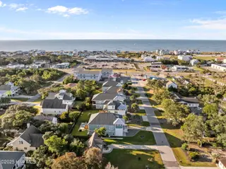 114 NE 50th Street, Oak Island, NC 28465 – photo 2: 5-web-or-mls-DJI_20251024084559_0032_D