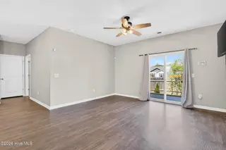 1573 Murre Court SE, Bolivia, NC 28422 — 5-bedroom home in Avalon, Bolivia, NC, photo 15 of 48: Backyard sliding door