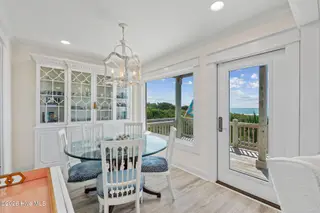 7803 Ocean Drive East, Emerald Isle, NC 28594 – photo 17: 7803_E_Ocean_Drive_#E_013_Dining_Room