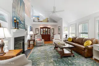 415 Hillcrest Drive, Morehead City, NC 28557 – photo 4: Living room with vaulted ceiling