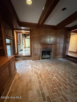 509 Bentmoor Drive, Whiteville, NC 28472 – photo 14: Study fireplace and brick flor