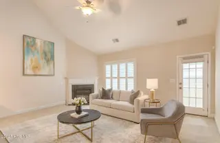 137 Bellwood Circle, Sunset Beach, NC 28468 – photo 23: AI Interior Staging 3.png