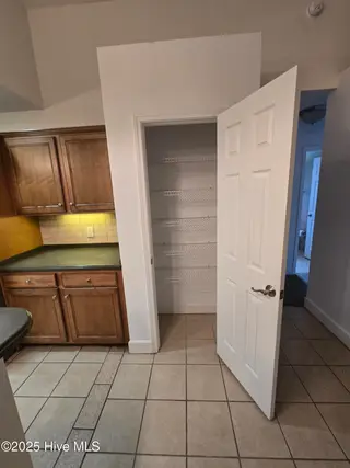 833 Fifty Lakes Drive, Southport, NC 28461 – photo 11: Kitchen Pantry