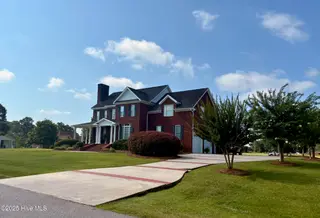 25 Muirfield Drive, Whiteville, NC 28472 – photo 5: Beautiful from every angle