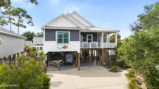 127 NE 34th Street, Oak Island, NC 28465 — 3-bedroom home in Tranquil Harbor, Oak Island, NC, photo 1 of 53: DJI_20260924024758_0348_D copy