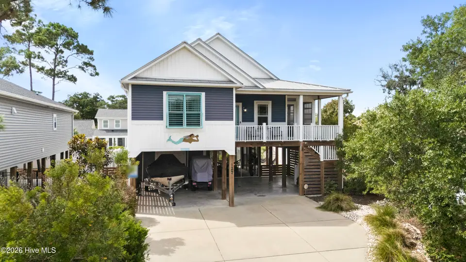 127 NE 34th Street, Oak Island, NC 28465 — 3-bedroom home in Tranquil Harbor, Oak Island, NC, photo 1 of 53: DJI_20260924024758_0348_D copy