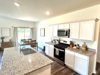 2033 Bogue Lane, New Bern, NC 28562 – photo 10: BRIGHT KITCHEN W/ GAS & GRANITE