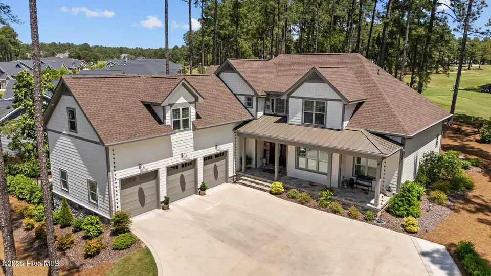 100 Holly Springs Court, Southern Pines, NC 28387 – photo 1 of 1: 2-web-or-mls-DJI_20250502125325_0422_D