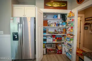 218 NE 67th Street, Oak Island, NC 28465 – photo 14: kitchen pantry