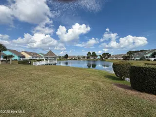 601 Sloop Pointe Lane, Kure Beach, NC 28449 – photo 3: Pond Scene