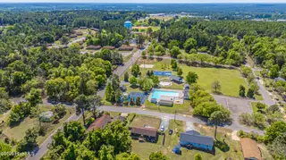 780 W Illinois Avenue, Southern Pines, NC 28387 – photo 3: DJI_20250418134616_0011_D