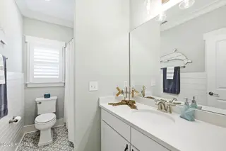202 NE 64th Street, Oak Island, NC 28465 – photo 17: Guest full bathroom