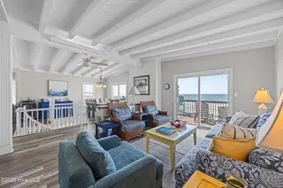 5127 W Beach Drive, Oak Island, NC 28465 – photo 8: 34_family room