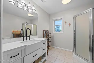 104 SW Yacht Drive, Oak Island, NC 28465 — 5-bedroom waterfront home, Oak Island, NC, photo 22 of 77: Flex living area
