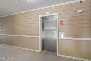 221 Woodlands Way Unit 21, Calabash, NC 28467 — 2-bedroom condo in Crow Creek, Calabash, NC, photo 5 of 39: Building Elevators