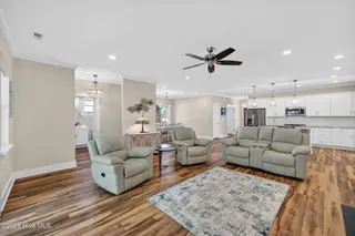 460 Summerhouse Drive, Holly Ridge, NC 28445 – photo 8: open living, dining and kitchen