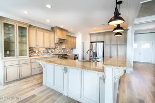 502 Shoreline Drive E, Sunset Beach, NC 28468 – photo 8: IMG_8696-1-kitchen