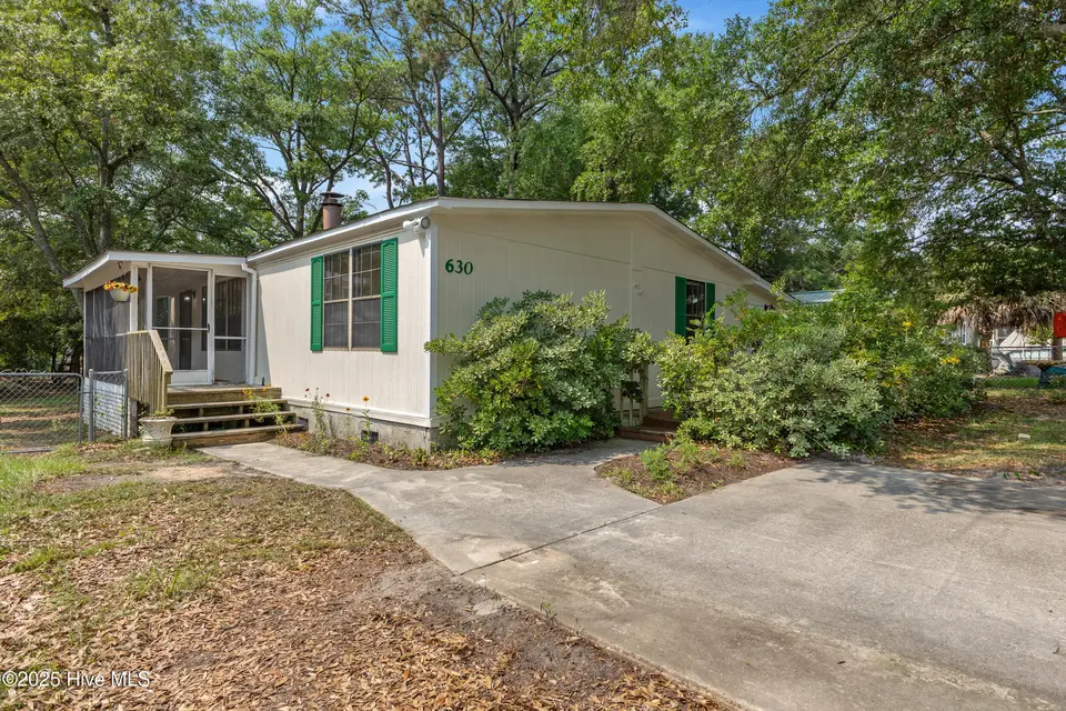 630 Dogwood Drive, Sunset Beach, NC 28468 – photo 1 of 36: 630 Dogwood Dr