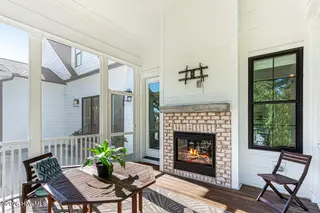 275 Hollycrest Drive, Pinehurst, NC 28374 — 5-bedroom home in Hollycrest, Pinehurst, NC, photo 24 of 42: Screened Porch with fireplace