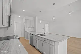 4503 Village Green Drive SW Homesite 91, Shallotte, NC 28470 — 3-bedroom home in Village Green SHLTE, Shallotte, NC, photo 18 of 49: 16_kitchen