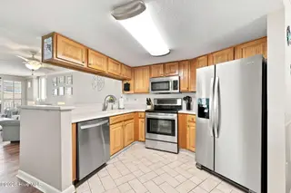 1400 E Fort Macon Road 519, Atlantic Beach, NC 28512 – photo 11: 28-web-or-mls-The Sands 519 - 033_Edit