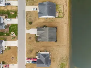 34 Lighthouse Cove Loop 113, Calabash, NC 28467 — 3-bedroom home in Lighthouse Cove, Calabash, NC, photo 3 of 46: 2-web-or-mls-DJI_20260208114130_0322_D