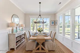 1943 Redfish SW, Supply, NC 28462 — 4-bedroom home in Oyster Harbour, Supply, NC, photo 6 of 42: Dining Room