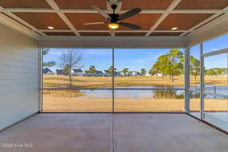 111 Windswept Lane, Beaufort, NC 28516 – photo 16: Screened Porch Overlooking Golf Course