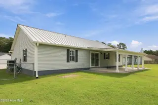 107 Fodder Drive, Hubert, NC 28539 — 3-bedroom home in Ole Mill Village, Hubert, NC, photo 7 of 59: 07_Rear_Side