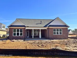 1160 Turnata Drive SE, Bolivia, NC 28422 – photo 7: Under construction 1.6.26 - rear