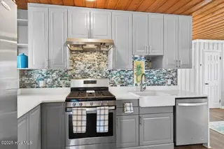 115 NE 66th Street, Oak Island, NC 28465 – photo 14: 59-Kahunaphoto