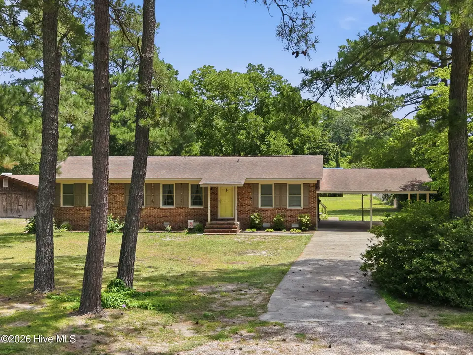 1156 S Asbury Church Road, Washington, NC 27889 – photo 1 of 35: 1-web-or-mls-DJI_20260707123909_0034_D