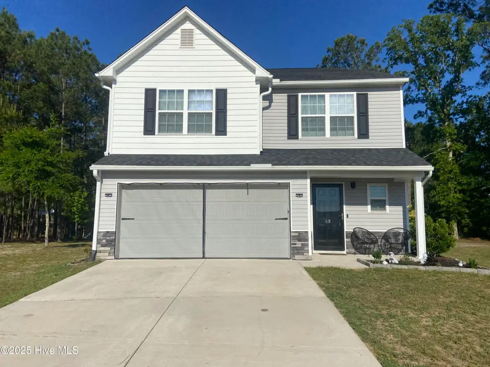 49 Patrick Henry Circle NW, Supply, NC 28462 — 3-bedroom home in Richmond Hills, Supply, NC, photo 1 of 36: IMG_3014