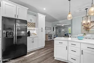 142 NW 12th Street, Oak Island, NC 28465 – photo 18: 27-web-or-mls-DSC06306