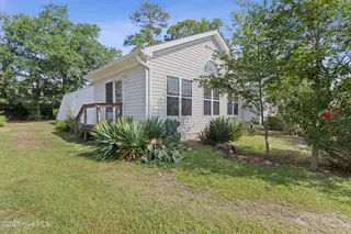 327 NE 54th Street, Oak Island, NC 28465 – photo 1: 1