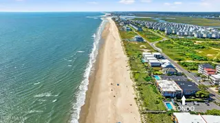 277 W First Street 1c, Ocean Isle Beach, NC 28469 — 2-bedroom condo in A Place At The Beach, Ocean Isle Beach, NC, photo 3 of 38: 36-web-or-mls-33 arrow